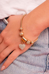 Suitor Sequence Gold ~ Paparazzi Bracelet
