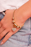 Suitor Sequence Gold ~ Paparazzi Bracelet