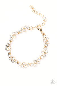 Still Glowing Strong Gold Bracelet - Glitzygals5dollarbling Paparazzi Boutique 