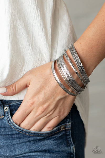 Paparazzi Relics On Repeat - Silver - Set of 9! Bangle