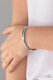 Paparazzi Crossing Over - Silver - High Sheen Glowing Silver - HINGED - Bracelet - Glitzygals5dollarbling Paparazzi Boutique 